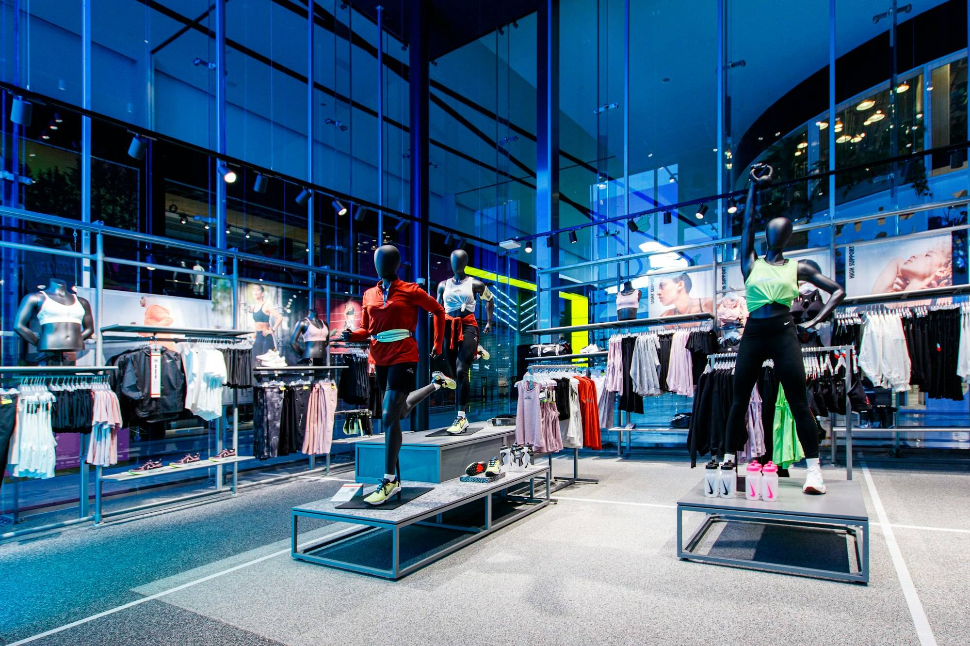A newly fitted-out retail store with display shelving and mannequins